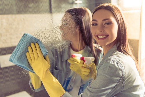 Team member checking cleaning products and safe handling procedures